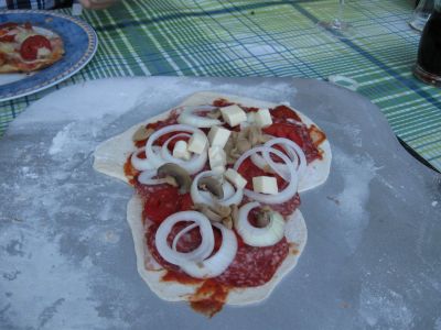 Pizza beladen